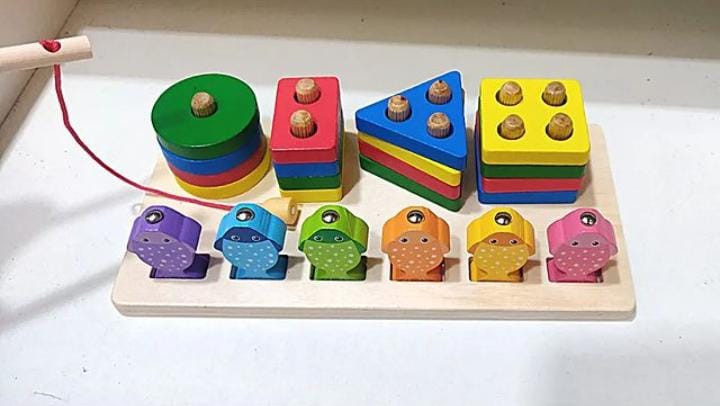 Wooden Fishing Coloum With Geomatric Stacking Set Shape.